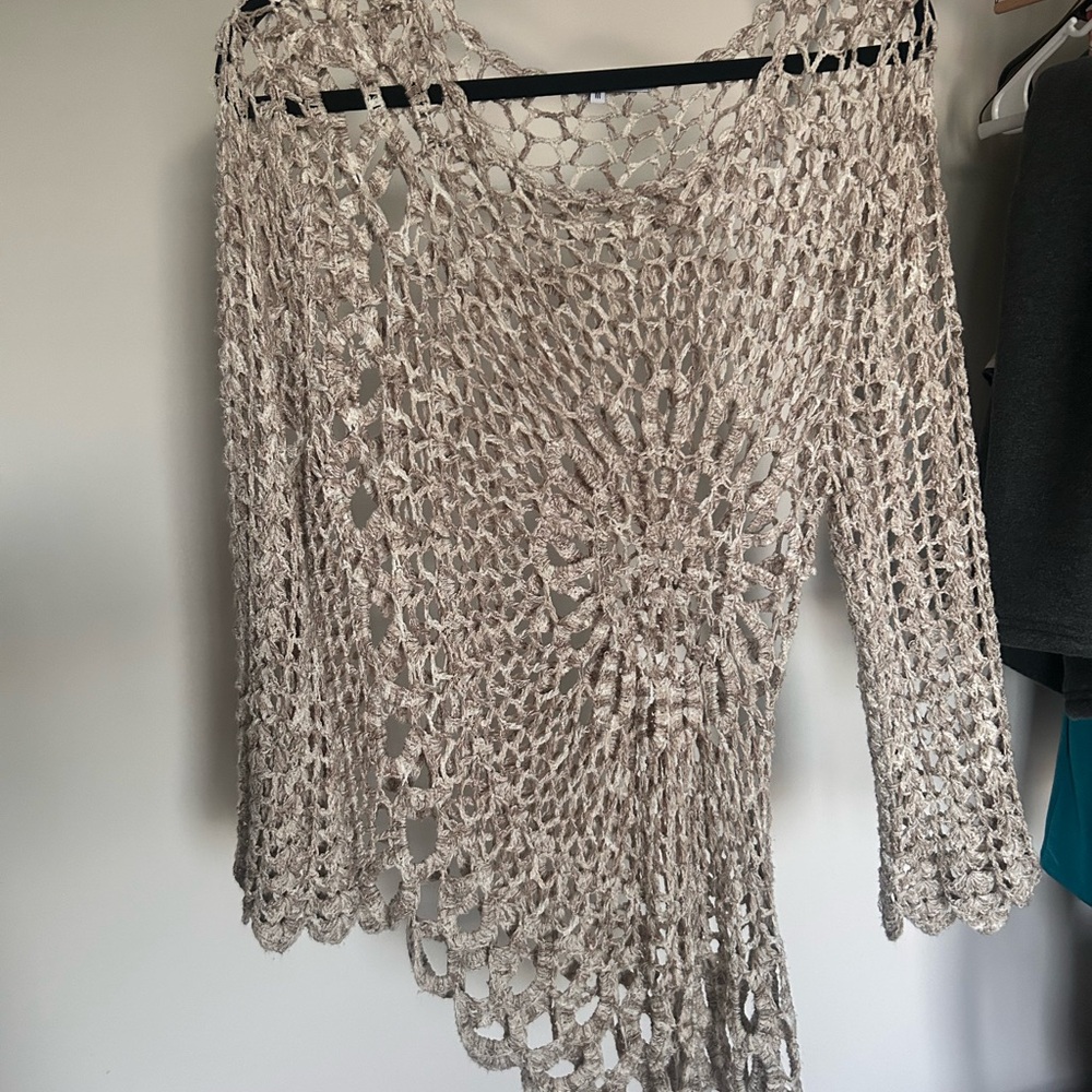 Crochet cover up, has been dry cleaned